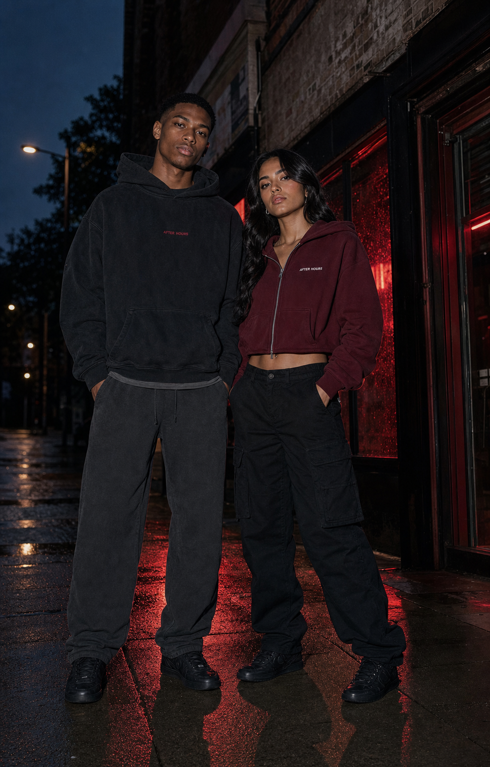 Two models wearing the Late Mile collection at night